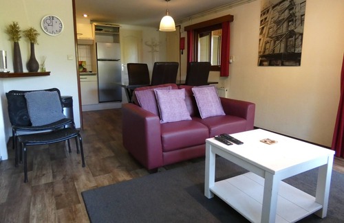 Marum Ski Chalet | Beautiful wooden chalet for rent against forest