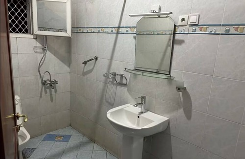 Moroni Hotel | Bedroom located at city center