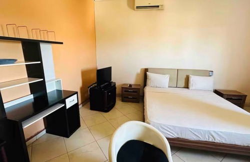 Moroni Hotel | Bedroom located at city center