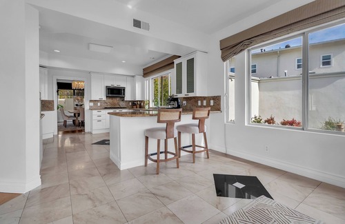 Bel Air House | Bel Air Tennis Villa offers serene canyon views and glimpses of the ocean.