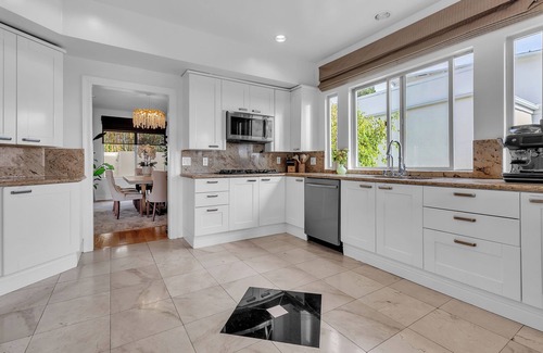 Bel Air House | Bel Air Tennis Villa offers serene canyon views and glimpses of the ocean.
