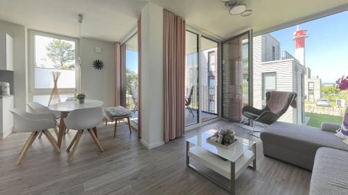 Marienleuchte Apartment | BeltBlick Fehmarn - moderne Ferienwohnung mit Meerblick und Sauna - Neubau