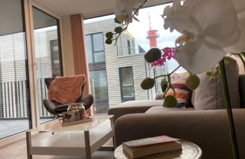 Marienleuchte Apartment | BeltBlick Fehmarn - moderne Ferienwohnung mit Meerblick und Sauna - Neubau