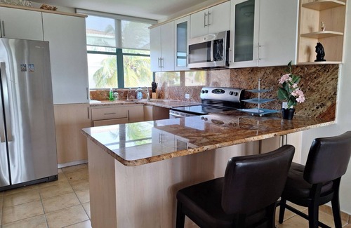 Las Carreras Condo | BEST AQUATIKA PENTHOUSE: truly beachfront, 10 beds, 5 rooms, 10 person capacity
