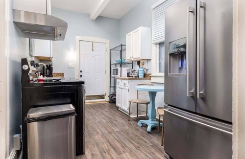 Macon House | Big Oak Bungalow 1 dreamy bedroom amazing porch