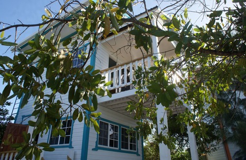Caye Caulker Cottage | Birdhouses Woodpecker is a very unique place in the sunset side of the island.