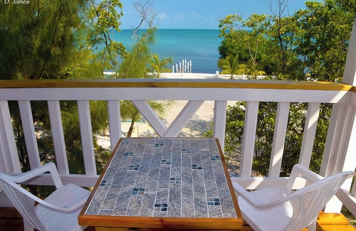 Caye Caulker Cottage | Birdhouses Woodpecker is a very unique place in the sunset side of the island.