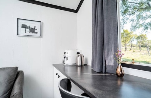 Hartbeespoort Ski Chalet | Black and White House
