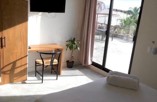 Downtown Holbox Hotel | Black flamingo