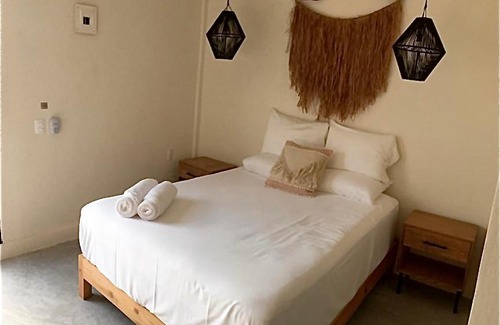 Downtown Holbox Hotel | Black flamingo