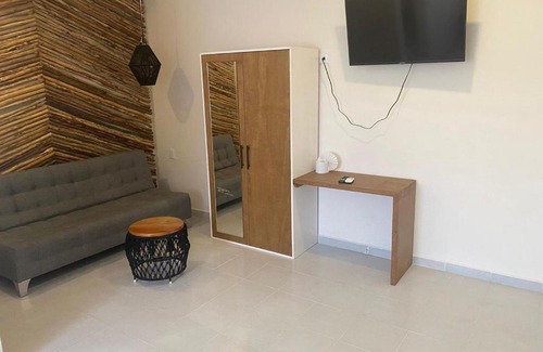 Downtown Holbox Hotel | Black flamingo