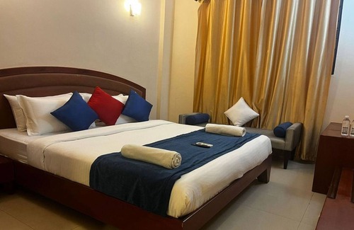 Shivaji Nagar Hotel | Blue Bliss Hotels By PPH Living Infantry Road