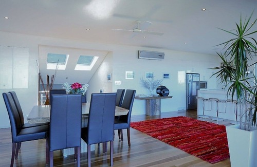 Gerroa House | BLUE SALT-Spectacular water views. Wood Burner Fire. Outdoor living on deck.