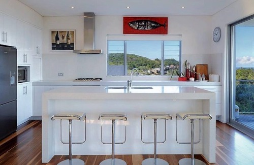 Gerroa House | BLUE SALT-Spectacular water views. Wood Burner Fire. Outdoor living on deck.