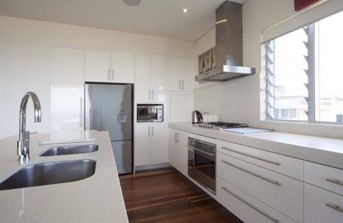 Gerroa House | BLUE SALT-Spectacular water views. Wood Burner Fire. Outdoor living on deck.