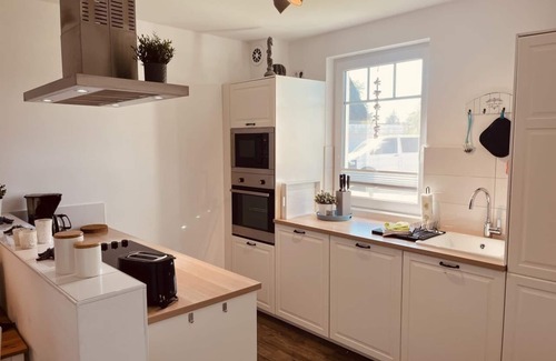 Born auf dem Darss Apartment | Blue - terrace, barbecue, dogs allowed, Baltic Sea 6km away, WLAN, bicycle shed