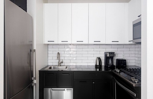 Financial District Apartment | Blueground | Financial District, rooftop, nr Wall St.