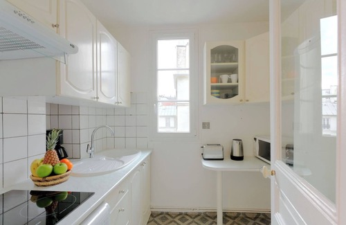 Quartier Sainte-Marguerite Apartment | BnBNook - Cozy 1BR in Trendy Bastille Neighborhood