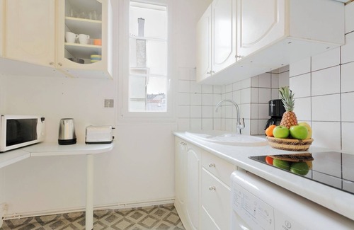 Quartier Sainte-Marguerite Apartment | BnBNook - Cozy 1BR in Trendy Bastille Neighborhood