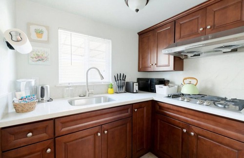 Montebello House | Bohemian Inspired Home: with a Roomy Queen Bed, High-Speed Internet, Your Own Patio, and On-Site Laundry.