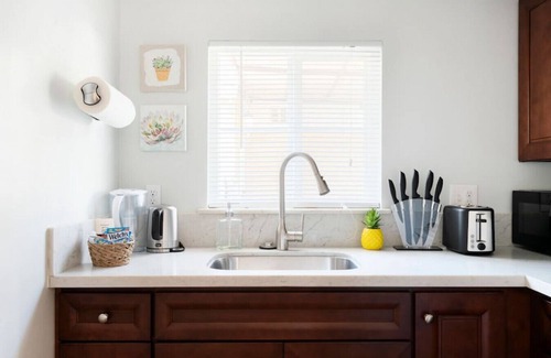 Montebello House | Bohemian Inspired Home: with a Roomy Queen Bed, High-Speed Internet, Your Own Patio, and On-Site Laundry.