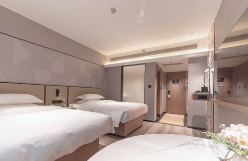 Wanxiu District Hotel | BORRMAN HOTEL WUZHOU
