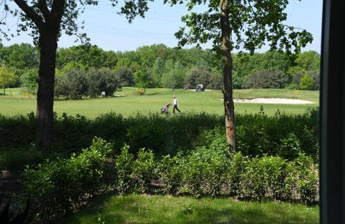 Den Hout House | Boshuis Golfzicht "Wellness, Golf & Nature"
