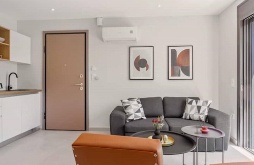 Thymari Villa | Boutique 2BR apartment in villa. Shared pool. Partial seaview
