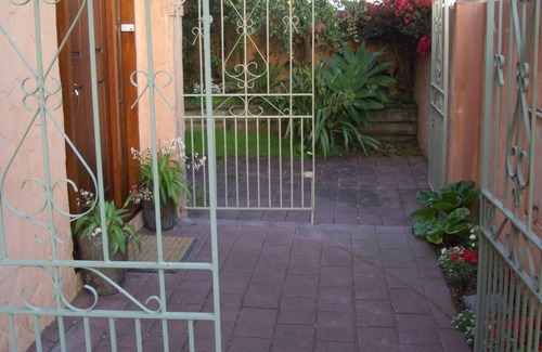 Orewa Apartment | Boutique holiday accommodation adjoining beach.