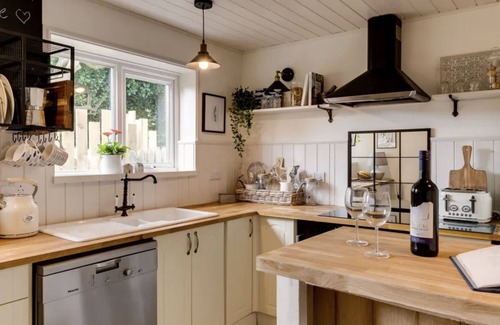 Llanbedrog Cottage | Boutique-style holiday cottage, beautifully decorated with wood burner & hot tub