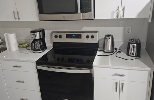 Regina House | Brand new, fully furnished suite in a serene East Regina neighborhood The Towns.