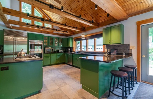 Lyman House | Breathtaking Lakefront Compound With Four Buildings and Every Amenity