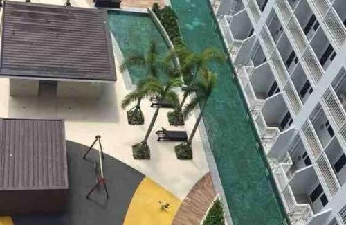 Barangay 76 Apartment | Breeze Residences - 1BR Unit with Balcony -Top Floor