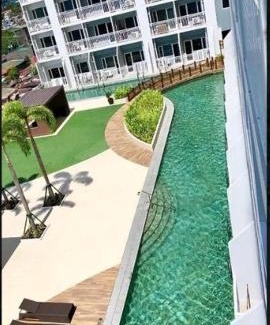 Barangay 76 Apartment | Breeze Residences - 1BR Unit with Balcony -Top Floor