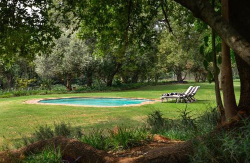 Hekpoort House | Bridgewaters Horse Park Poolside Rondawel