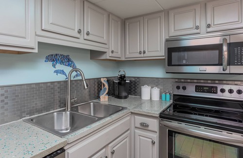 Villa Sabine Condo | Bright and Fun Beach Themed Condo - On Little Sabine Bay - Sand Dollar W107