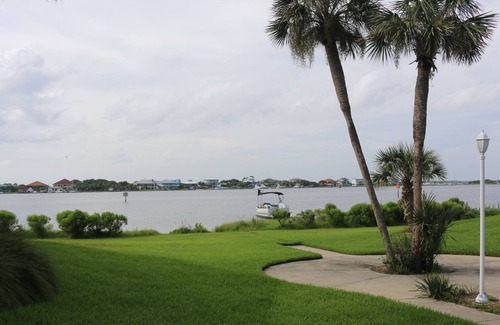 Villa Sabine Condo | Bright and Fun Beach Themed Condo - On Little Sabine Bay