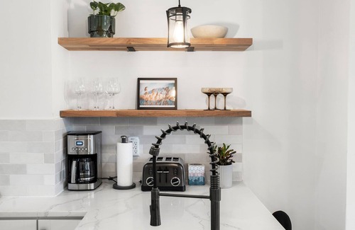 Roxbury Condo | Bright Brownstone w Terrace+View