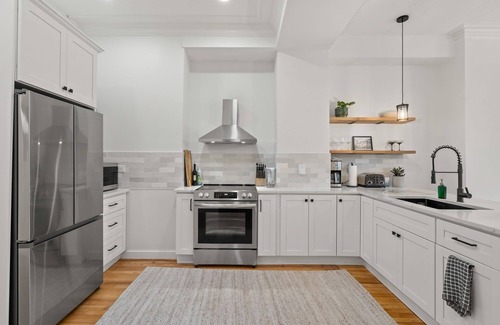 Roxbury Condo | Bright Brownstone w Terrace+View