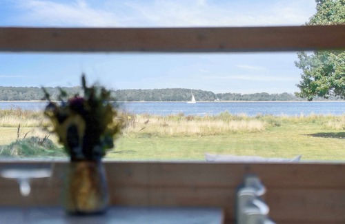 Jægerspris House | Bright, cozy summer house directly by the fjord