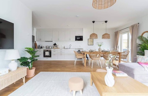 Bastad Condo | Bright Ground Floor Corner Home with Cozy Outdoor
