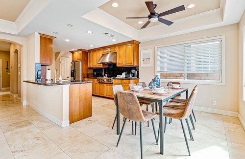 Naples House | Bright home on the channel with expansive patio & elevator