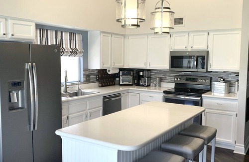 Encanto Neighborhood House | Bright home with open floor plan and vaulted ceilings