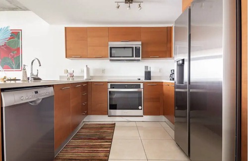 Midtown Condo | Bright Sleek condo with wonderful skyline view