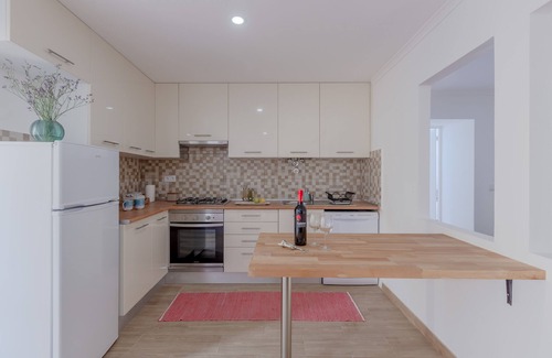 Santo Estevao Apartment | Bright & Spacious W/Orange Tree Patio Apartment by TimeCooler