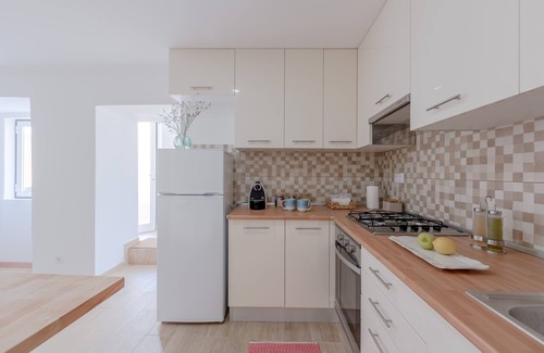 Santo Estevao Apartment | Bright & Spacious W/Orange Tree Patio Apartment by TimeCooler