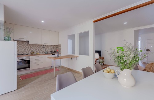 Santo Estevao Apartment | Bright & Spacious W/Orange Tree Patio Apartment by TimeCooler