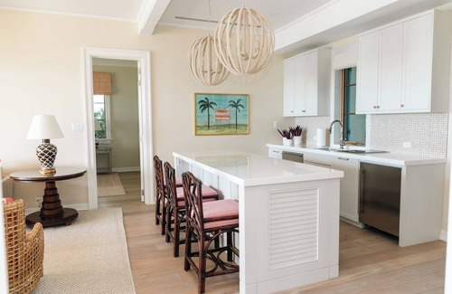 Dunmore Town Condo | Briland Club - Coral Cottage, Luxury Waterfront Vacation Rental, Private Pool