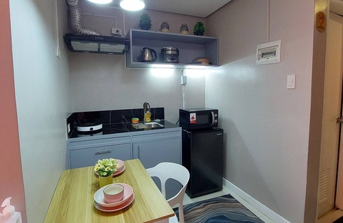 Ermita Night District Condo | Budget Stay with Bay & City Lights View