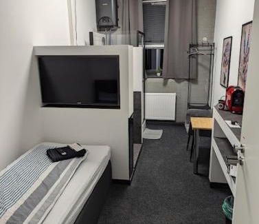 Heimsheim Hotel | BUSINESS-MOTEL, 24h self checkin, free parking, eCharging